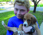 Jessee with his
                                          puppy Liberty