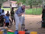 Dr. Michael Sweat pumping water