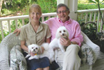 Dr. Frank Brescia with wife an two dogs