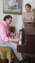 Dr. Frank Brescia at the piano